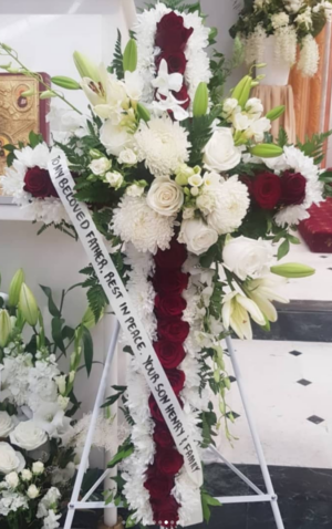 Cross Wreath with Red Flowers